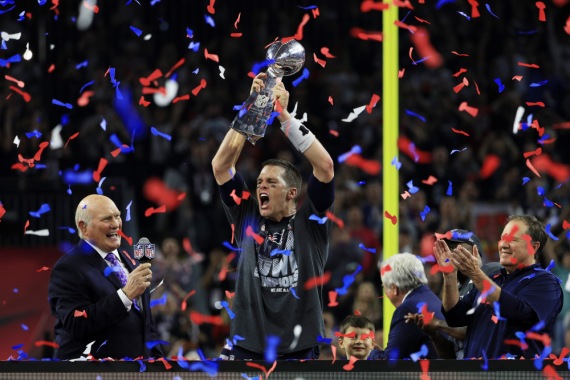 HOUSTON, TX - FEBRUARY 05:  Tom Brady #12 of the New England Patriots holds the Vince Lombardi Trophy after defeating the Atlanta Falcons 34-28 during Super Bowl 51 at NRG Stadium on February 5, 2017 in Houston, Texas.  (Photo by Mike Ehrmann/Getty Images) ORG XMIT: 694911629 ORIG FILE ID: 633957940